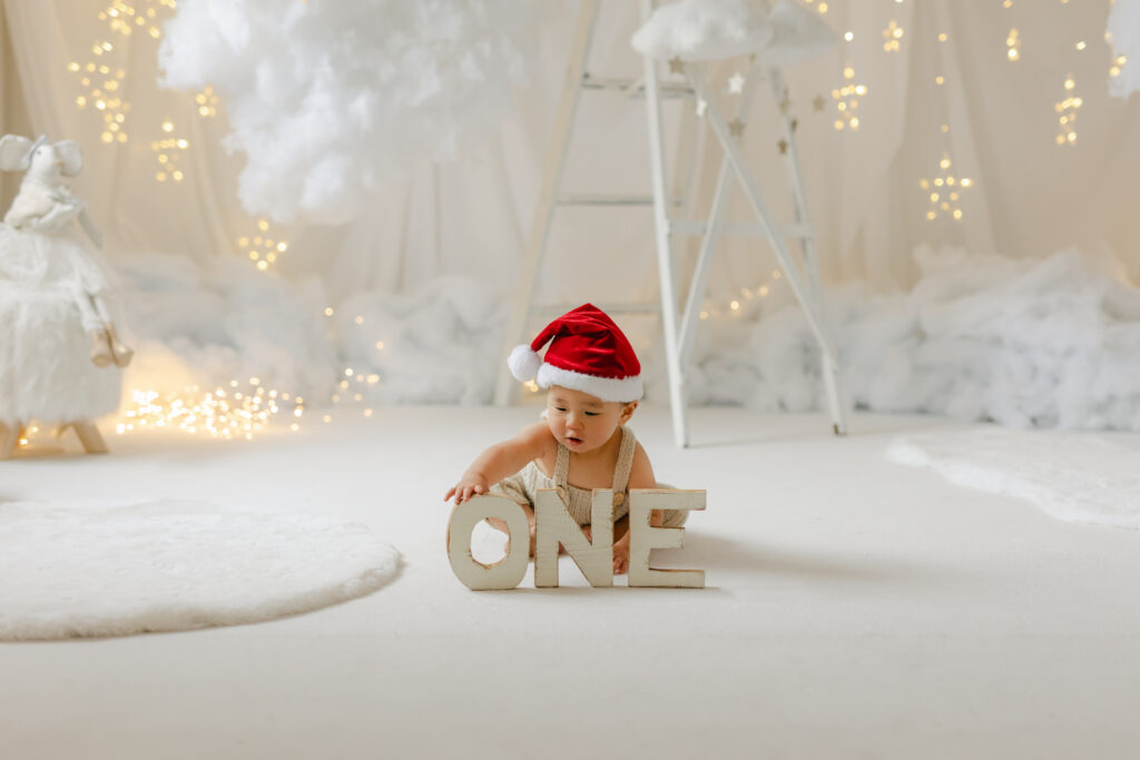 A baby wearing a Santa hat in Toronto