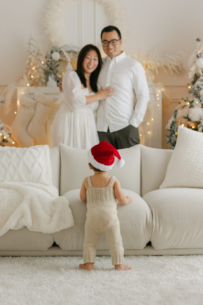 A family in a Toronto studio with Christmas decor